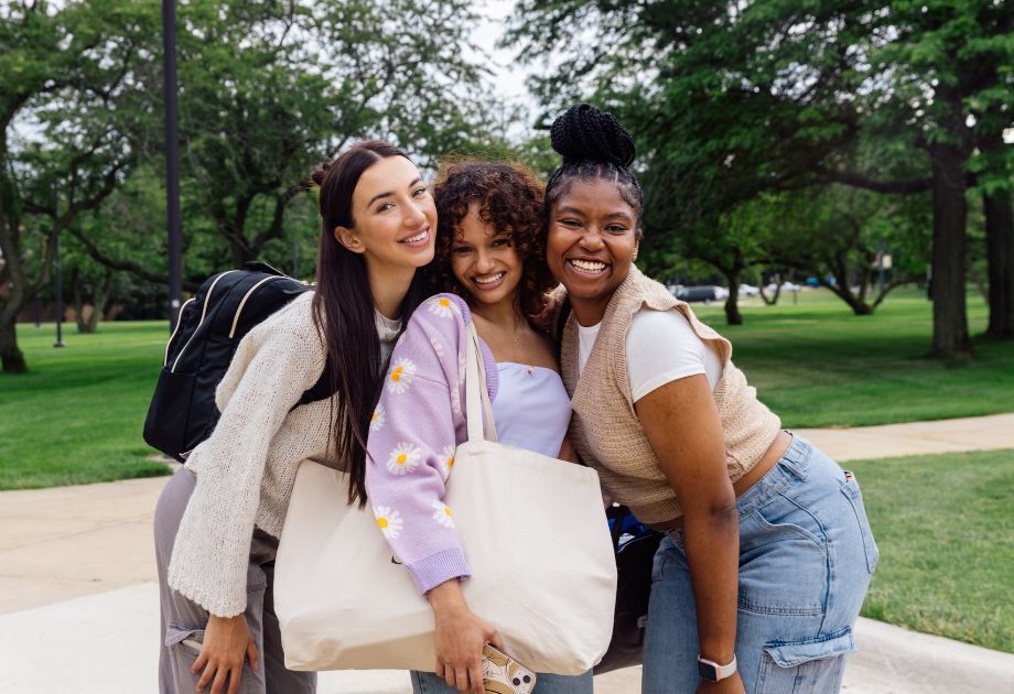 3 young women smiling